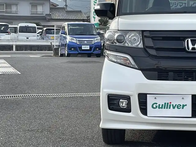 ホンダ Ｎ ＢＯＸ 2トーン カスタム G ターボLパッケージ 栃木県 2015(平27)年 6.1万km プレミアムホワイトパールⅡ ワンオーナー/社外ディスプレイオーディオ/【FM/AM/CD/ワンセグTV】/バックカメラ/ETC/両側パワースライドドア/ハーフレザーシート/ベンチシート/クルーズコントロール/横滑り防止装置/盗難防止装置/LEDヘッドライト/オートライト/プッシュスタート/スマートキー/純正フロアマット