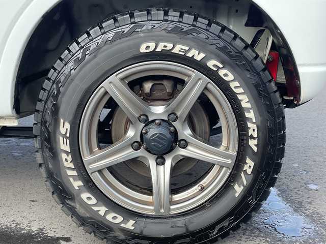 スズキ ジムニー XG 千葉県 2017(平29)年 11.1万km スペリアホワイト 4WD/5MT/社外1DINオーディオ/リモコンキー/ルーフキャリア/社外サスペンション/ETC/ABS