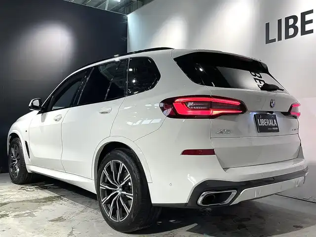 ＢＭＷ Ｘ５ xDrive 35d Mスポーツ 道央・札幌 2022(令4)年 1.9万km アルピンホワイトⅢ ハイラインpkg/　・アッシュ・グレイン・ブラウン・ファイン・ウッド・トリム/レザー・フィニッシュ・ダッシュボード/ドライビング・アシスト・プロフェッショナル/　・ACC/　・レーン・ディパーチャー・ウォーニング/　・レーン・チェンジ・ウォーニング/　・レーン・チェンジ・アシスト/パーキング・アシスト・プラス/　・PDC/　・パーキングアシスト/　・パノラマ・サイド・ビューカメラ/電動シート/シートヒーター/BMWヘッドアップディスプレイ/ワイヤレスチャージング/アンビエントライト/アダプティブLEDヘッドライト/オートライト/レインセンサー/オートマチック・テールゲート/ヒルディセントコントロール/ETC/取扱説明書、スペアキー1本有