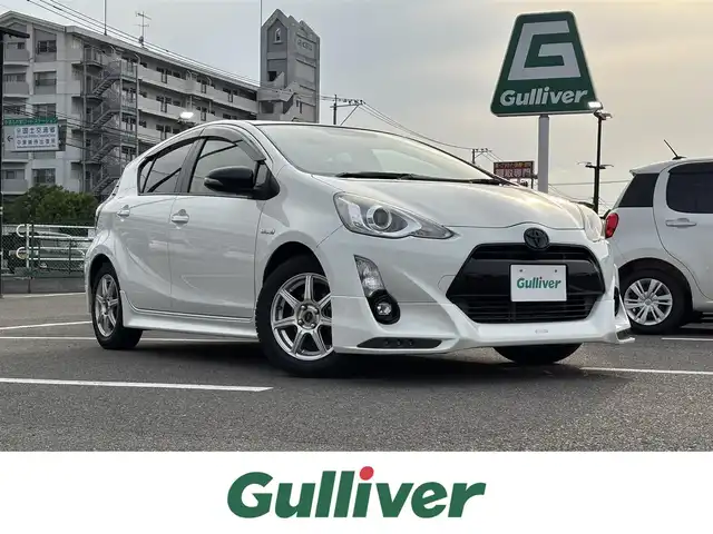 トヨタ アクア G ブラックソフトレザーセレ 大分県 2015(平27)年 9.4万km ライムホワイトパールクリスタルシャイン ・純正SDナビ(CD.DVD.SD.BT)/・バックカメラ/・フルセグテレビ/・TRDエアロ/・クルーズコントロール/・ETC/・ステアリングリモコン/・オートライト/・ドライブレコーダー/・シートヒーター/・社外スピーカー