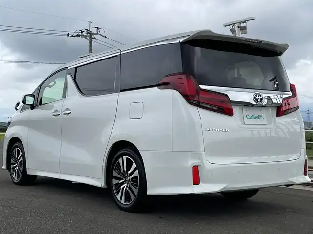 トヨタ アルファード S Cパッケージ 佐賀県 2022(令4)年 4.4万km ホワイトパールクリスタルシャイン 純正9インチディスプレイオーディオ/・フルセグTV/CD/DVDUSB/Bluetooth/純正12インチフリップダウンモニター/バックカメラ/前後ドライブレコーダー/ビルトインETC/両側パワースライドドア/パワーバックドア/リバース連動ドアミラー/後席エアコン/電子パーキングブレーキ/AUTO HOLD機能/合皮シート/DNセカンド席パワーシート(D席メモリー機能付)/DN席シートヒーター/シートベンチレーション/N席セカンド席電動オットマン/キャプテンシート/後席サンシェード/ISOFIX対応/木目調革巻きステアリング/ステアリングヒーター/ステアリングリモコン/純正18インチアルミホイール/純正三眼LEDヘッドライト/・オートマチックハイビーム/純正LEDフォグランプ/新車保証書/取扱説明書/スペアキー１本/トヨタセーフティセンス/・レーダークルーズコントロール/・レーントレーシングアシスト/・クリアランスソナー/・パーキングサポートブレーキ/・プリクラッシュセーフティ/・ロードサインアシスト