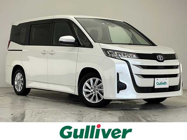 トヨタ ノア ハイブリッド G 愛知県 2022(令4)年 1万km ホワイトパールクリスタルシャイン 衝突軽減システム/純正10.5型ディズプレイオーディオ　ナビあり/フリップダウンモニター/両側パワースライドドア/レーダークルーズコントロール/フルセグ/CD DVD/Bluetooth/バックカメラ/コーナーセンサー/純正アルミホイール/ETC2.0/ブラインドスポットモニター/LEDヘッドライト/オートマチックハイビーム/ドライブレコーダー/ステアリングスイッチ/スマートキー/プッシュスタート