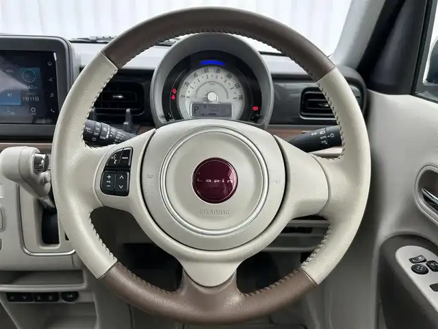 スズキ ラパン ＬＣ X 群馬県 2022(令4)年 2万km フォーンベージュメタリック/アーバンブラウン 2トーン ワンオーナー/純正ディスプレイオーディオ（FM/AM/Bluetooth/USB）/スズキセーフティサポート/・デュアルカメラブレーキサポート/・車線逸脱警報機能/バックカメラ/前席シートヒーター/ハーフレザーシート/プッシュスタート/ビルトインETC/革巻きステアリング/ステアリングスイッチ/アイドリングストップ/純正アルミホイール/純正フロアマット/LEDヘッドライト/ドアバイザー/２トーンルーフ/保証書/取扱説明書/スペアーキー１本