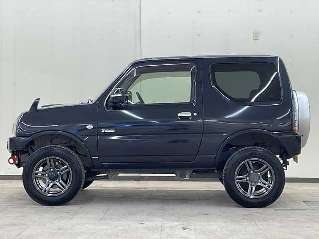 スズキ ジムニー クロスアドベンチャー 道央・札幌 2013(平25)年 3.1万km ブルーイッシュブラックパール3 /4WD//社外ナビ：AVN-Z05i/（CD/DVD/BT/SD/ラジオ/フルセグ）//寒冷地仕様//シートヒーター（運転席）//ミラーヒーター//社外エンジンスターター //ETC//社外レーダー//社外マフラー//社外パンパー//リフトアップ