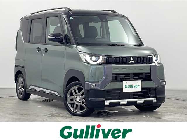 三菱 デリカミニ T プレミアム 愛知県 2025(令7)年 0.1千km 緑Ⅱ /ワンオーナー//禁煙車//純正オーディオ//マルチアラウンドモニター//デジタルルームミラー(マルチアラウンドモニター付)//Bluetooth・USB・AppleCarPlay・AndroidAuto//純正15インチアルミホイール//ルーフレール//MI-PILOT//アダプティブクルーズコントロール(ACC)//車線維持支援//衝突被害軽減ブレーキ//車線逸脱警報//先行車発進お知らせ//標識認識//フロント・リヤセンサー//ふらつき警報//ヒルディセントコントロール//アイドリングストップ//横滑り防止//オートマチックハイビーム//LEDヘッドライト//オートライト//フロントフォグランプ//電動格納ミラーウィンカー//プッシュスタート//本革巻きステアリング//ステアリングスイッチ//ステアリングヒーター//パドルシフト//ファブリック+合成皮革シート//前席シートヒーター//電子パーキングブレーキ//ブレーキオートホールド//リヤサーキュレーター(プラズマクラスター付)//寒冷地仕様//イモビライザー//スペアキー1本//新車保証書・取扱説明書