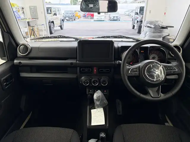 スズキ ジムニー ノマド FC 愛知県 2025(令7)年 0.1千km ベージュ 登録済未使用車/登録時走行距離37km/スズキセーフティサポート/4WD/革巻きステアリング/ステアリングリモコン/アダプティブクルーズコントロール/前席シートヒーター/純正15インチアルミホイール/純正フロアマット/ミラーヒーター