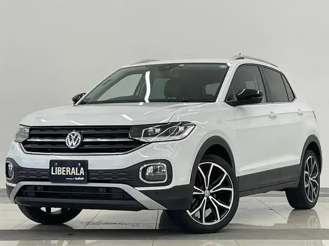 フォルクスワーゲン Ｔ－クロス TSI 1stプラス 岡山県 2020(令2)年 5.1万km ピュアホワイト オールインセーフティ（予防安全装備）/プリクラッシュブレーキ/AAC/レーンキープアシスト/ブラインドスポット/リアトラフィックアラート/ドライバー疲労検知/ハイビームアシスト/パークアシスト/PDC/リアビューカメラ/LEDヘッドライト/純正ナビ/フルセグTV/AppleCarPlay/ETC/純正18インチAW