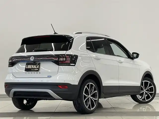フォルクスワーゲン Ｔ－クロス TSI 1stプラス 岡山県 2020(令2)年 5.1万km ピュアホワイト オールインセーフティ（予防安全装備）/プリクラッシュブレーキ/AAC/レーンキープアシスト/ブラインドスポット/リアトラフィックアラート/ドライバー疲労検知/ハイビームアシスト/パークアシスト/PDC/リアビューカメラ/LEDヘッドライト/純正ナビ/フルセグTV/AppleCarPlay/ETC/純正18インチAW