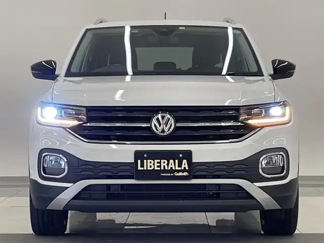 フォルクスワーゲン Ｔ－クロス TSI 1stプラス 岡山県 2020(令2)年 5.1万km ピュアホワイト オールインセーフティ（予防安全装備）/プリクラッシュブレーキ/AAC/レーンキープアシスト/ブラインドスポット/リアトラフィックアラート/ドライバー疲労検知/ハイビームアシスト/パークアシスト/PDC/リアビューカメラ/LEDヘッドライト/純正ナビ/フルセグTV/AppleCarPlay/ETC/純正18インチAW