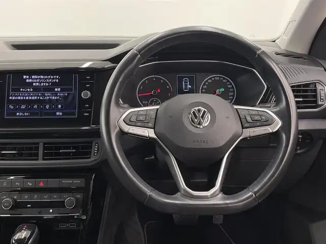 フォルクスワーゲン Ｔ－クロス TSI 1stプラス 岡山県 2020(令2)年 5.1万km ピュアホワイト オールインセーフティ（予防安全装備）/プリクラッシュブレーキ/AAC/レーンキープアシスト/ブラインドスポット/リアトラフィックアラート/ドライバー疲労検知/ハイビームアシスト/パークアシスト/PDC/リアビューカメラ/LEDヘッドライト/純正ナビ/フルセグTV/AppleCarPlay/ETC/純正18インチAW