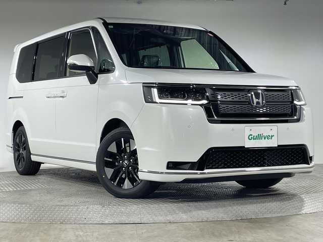 ホンダ ステップワゴン スパーダ eHEV 神奈川県 2025(令7)年 0.1千km プラチナホワイトパール 登録済未使用車/純正11.4型メモリーホンダコネクトナビゲーション【LXM-247VfLi】/フルセグ　Bluetooth　CD DVD　SD　USB　/バックカメラ/両側電動スライドドア/パワーバックドア/ホンダセンシング/CMBS衝突軽減ブレーキ/LKAS車線維持支援システム/路外逸脱制御機能/渋滞運転支援機能/誤発進抑制機能/ブラインドスポットインフォメーション/レーダークルーズコントロール/ECON/アイドリングストップ/ハーフレザーシート/前席シートヒーター/革巻きステアリング/パドルシフト/ステアリングスイッチ/電動パーキングブレーキ/オートブレーキホールド/プッシュスタート/スマートキー/LEDヘッドランプ/フロントフォグランプ/純正16インチアルミホイール/電格ウインカーミラー/取説　保証書　スペアキー