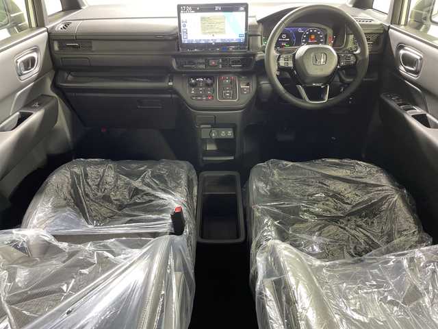ホンダ ステップワゴン スパーダ eHEV 神奈川県 2025(令7)年 0.1千km プラチナホワイトパール 登録済未使用車/純正11.4型メモリーホンダコネクトナビゲーション【LXM-247VfLi】/フルセグ　Bluetooth　CD DVD　SD　USB　/バックカメラ/両側電動スライドドア/パワーバックドア/ホンダセンシング/CMBS衝突軽減ブレーキ/LKAS車線維持支援システム/路外逸脱制御機能/渋滞運転支援機能/誤発進抑制機能/ブラインドスポットインフォメーション/レーダークルーズコントロール/ECON/アイドリングストップ/ハーフレザーシート/前席シートヒーター/革巻きステアリング/パドルシフト/ステアリングスイッチ/電動パーキングブレーキ/オートブレーキホールド/プッシュスタート/スマートキー/LEDヘッドランプ/フロントフォグランプ/純正16インチアルミホイール/電格ウインカーミラー/取説　保証書　スペアキー