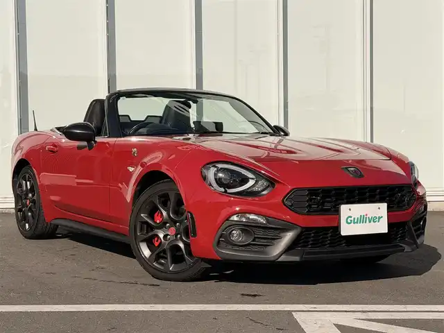 アバルト １２４ スパイダー 神奈川県 2016(平28)年 9.7万km 赤 純正ナビ／フルセグＴＶ／Ｂｌｕｅｔｏｏｔｈ／ＣＤ／ＤＶＤ/クルーズコントロール/バックカメラ/前席シートヒーター/レザーシート/リアコーナーセンサー/オートライト/フォグランプ/スペアキー/ABS/盗難防止装置/横滑り防止装置/LEDヘッドライト/取扱説明書