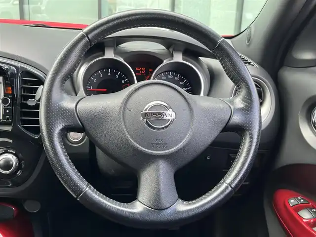 日産 ジューク 16GT FOUR タイプV 香川県 2014(平26)年 7.7万km パッションレッド 登録時走行距離：76270km/4WD/ターボ/ディーラー純正ナビ/　CD BT フルセグTV/バックカメラ/ビルトインETC/ドライブレコーダー/コーナーセンサー/HIDヘッドライト/オートライト/フォグランプ/横滑り防止装置/革巻きステアリング/プッシュスタート/スマートキー/スペアキー