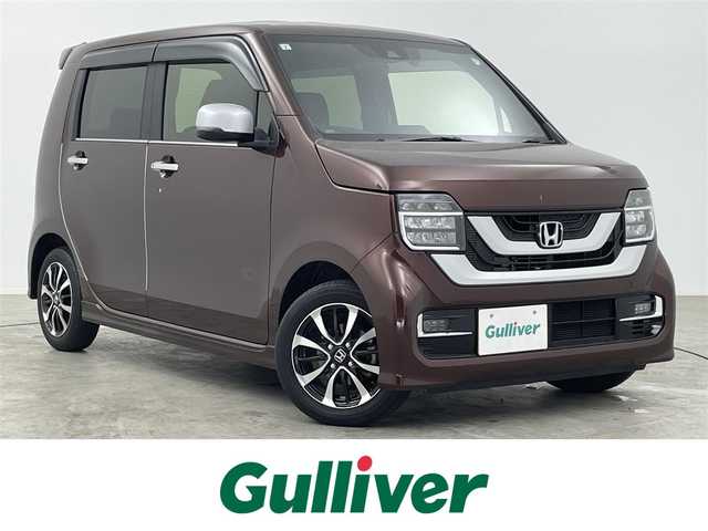 ホンダ Ｎ ＷＧＮ カスタム L ホンダセンシング 大分県 2021(令3)年 2.9万km プレミアムアガットブラウンP 純正8型インターナビ/(CD/DVD/Bluetooth/フルセグTV/SD)/バックカメラ/Honda　SENSING/・衝突軽減ブレーキ/・先行車発進お知らせ機能/・歩行者事故低減ステアリング/・路外逸脱抑制機能/・標識認識機能/・オートハイビーム機能/・渋滞追従機能付アダプティブクルーズコントロール/・車線維持支援システム/・誤発進抑制機能/オートリトラミラー/ビルトインETC/プッシュスタート/スマートキー/純正ドライブレコーダー前後/シートヒーター/電動格納ウィンカーミラー/ステアリングリモコン/フォグランプ/ドアバイザー