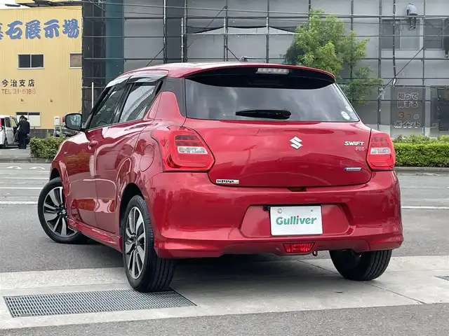 スズキ スイフト HYBRID RS 愛媛県 2017(平29)年 5.7万km バーニングレッドPM 登録時走行距離：56726km/ECLIPSE製7インチナビ/CD/DVD/フルセグTV/Bluetooth/バックカメラ/ETC/衝突被害軽減システム/横滑り防止装置/レーンキープアシスト/クルーズコントロール/アイドリングストップ/LEDヘッドライト/フォグランプ/オートライト/運転席シートヒーター/パドルシフト/エンジンスタートボタン/スマートキー/社外フロアマット/純正フ16インチアルミホイール