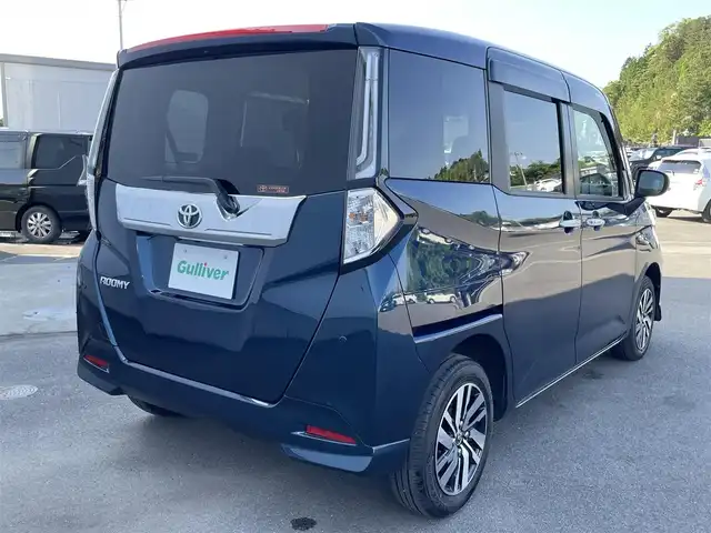 トヨタ ルーミー カスタムG 愛媛県 2023(令5)年 1.8万km レーザーブルークリスタルシャイン スマートアシスト/衝突回避支援ブレーキ/車線逸脱警報/ブレーキ制御付御発進抑制機能/アダプティブクルーズコントロール/先行車発進お知らせ機能/ふらつき警報/路外逸脱警報/標識認識機能/社外7インチナビ【AVN-R10W】/　CD/DVD/Bluetooth/フルセグTV/ビルトインETC/両側パワースライドドア/オートライト/LEDヘッドライト/フロントフォグ/革巻きステアリング/電子パーキングブレーキ/フロアマット/ドアバイザー