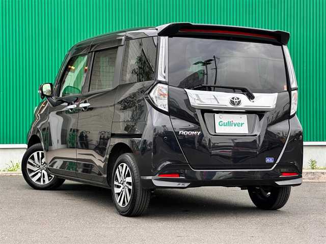 トヨタ ルーミー カスタムG 宮城県 2022(令4)年 1.7万km ブラックマイカメタリック コンフォートパッケージ/・シートヒーター（運転席/助手席）/・シートバックテーブル（運転席/助手席）/ナビレディパッケージ/・バックカメラ/・ステアリングスイッチ/＝＝＝/スマートアシスト/・衝突回避支援ブレーキ機能/・衝突警報/・車線逸脱警報機能/・ブレーキ制御付誤発進抑制機能/・先行車発進お知らせ機能/・アダプティブドライビングビーム/・アダプティブクルーズコントロール/・ふらつき警報/・サイドビューランプ/・コーナーセンサー/・路外逸脱警報/・標識認識機能/純正12インチフリップダウンモニター（V12T-R68C）/純正9インチナビ（NSZT-Y68T）/・CD/DVD/・Bluetooth/・フルセグTV/ビルトインETC2.0/ウェルカムパワースライドドア（運転席側/助手席側）/革巻きステアリング/電動パーキングブレーキ/ブレーキホールド/LEDヘッドランプ/フォグランプ/オートライト/スマートキー＆プッシュスタート/スペアキー/電動格納ミラー/純正14インチAW/純正ドアバイザー/純正フロアマット/Wエアバッグ