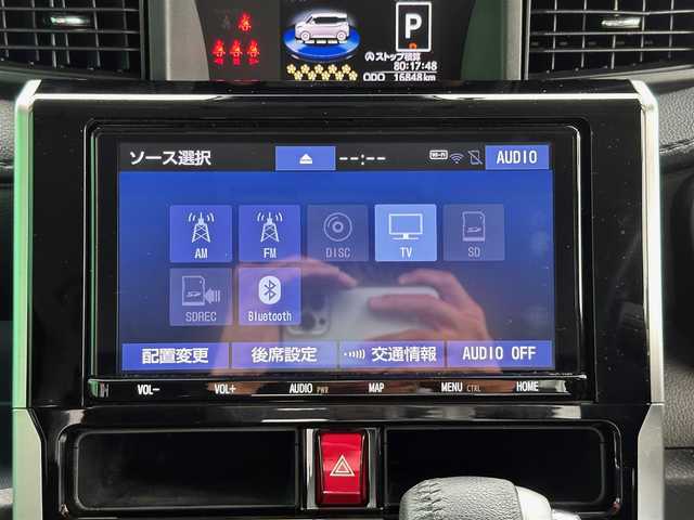 トヨタ ルーミー カスタムG 宮城県 2022(令4)年 1.7万km ブラックマイカメタリック コンフォートパッケージ/・シートヒーター（運転席/助手席）/・シートバックテーブル（運転席/助手席）/ナビレディパッケージ/・バックカメラ/・ステアリングスイッチ/＝＝＝/スマートアシスト/・衝突回避支援ブレーキ機能/・衝突警報/・車線逸脱警報機能/・ブレーキ制御付誤発進抑制機能/・先行車発進お知らせ機能/・アダプティブドライビングビーム/・アダプティブクルーズコントロール/・ふらつき警報/・サイドビューランプ/・コーナーセンサー/・路外逸脱警報/・標識認識機能/純正12インチフリップダウンモニター（V12T-R68C）/純正9インチナビ（NSZT-Y68T）/・CD/DVD/・Bluetooth/・フルセグTV/ビルトインETC2.0/ウェルカムパワースライドドア（運転席側/助手席側）/革巻きステアリング/電動パーキングブレーキ/ブレーキホールド/LEDヘッドランプ/フォグランプ/オートライト/スマートキー＆プッシュスタート/スペアキー/電動格納ミラー/純正14インチAW/純正ドアバイザー/純正フロアマット/Wエアバッグ