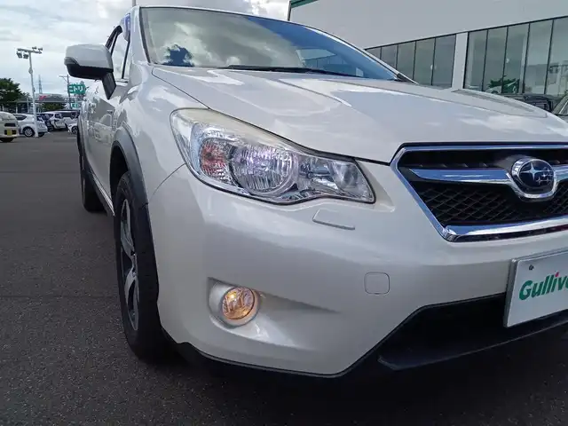 スバル インプレッサ ＸＶ ハイブリッド 2．0i－L アイサイト 福井県 2014(平26)年 12万km サテンホワイトパール 衝突被害軽減システム/メモリナビ（AVIC-MRZ099W）/・（CD/DVD/Bluetooth）/バックカメラ/ETC/パドルシフト/ステアリングスイッチ/前席パワーシート/冬用スタッドレスタイヤ積込/純正フロアマット/スマートキー