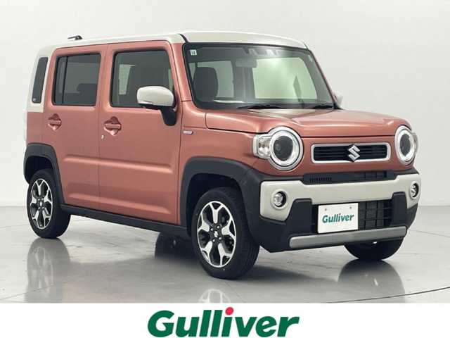 スズキ ハスラー HYBRID X 熊本県 2022(令4)年 0.9万km コーラルオレンジメタリック/ソフトベージュメタリック 社外ナビCN-HE01WD（ＣＤ・ＤＶＤ・フルセグ・ＢＴ・ＵＳＢ）/ＥＴＣ　/前席シートヒーター　/後ろのみコーナーセンサー　/スズキセーフティサポート/・衝突軽減ブレーキ/・デュアルカメラブレーキサポート/・後退時ブレーキサポート/・誤発進制御機能/・車線逸脱抑制機能/・ふらつき警報機能/・ハイビームアシスト/・標識認識機能/・先行車発進お知らせ機能/横滑り防止/アイドリングストップ/社外フロアマット/純正１５インチAW/オートライト/LEDヘッドライト/フォグライト/スマートキー/プッシュスタート/スペアキー1本