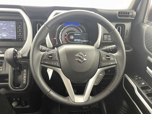 スズキ ハスラー HYBRID X 熊本県 2022(令4)年 0.9万km コーラルオレンジメタリック/ソフトベージュメタリック 社外ナビCN-HE01WD（ＣＤ・ＤＶＤ・フルセグ・ＢＴ・ＵＳＢ）/ＥＴＣ　/前席シートヒーター　/後ろのみコーナーセンサー　/スズキセーフティサポート/・衝突軽減ブレーキ/・デュアルカメラブレーキサポート/・後退時ブレーキサポート/・誤発進制御機能/・車線逸脱抑制機能/・ふらつき警報機能/・ハイビームアシスト/・標識認識機能/・先行車発進お知らせ機能/横滑り防止/アイドリングストップ/社外フロアマット/純正１５インチAW/オートライト/LEDヘッドライト/フォグライト/スマートキー/プッシュスタート/スペアキー1本