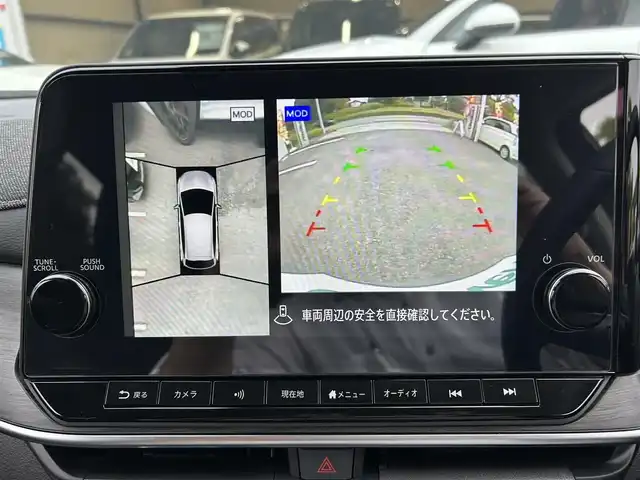 日産 オーラ G レザーエディション 神奈川県 2024(令6)年 0.5万km グレー NissanConnectナビ・フルセグ・USB・Bluetooth・AppleCarPlay/BOSEパーソナルプラスサウンドシステム/ビルトインETC2.0/USB電源ソケット（タイプC（フロント、リア）、タイプA（フロント））/ワイヤレス充電/プロパイロット（ナビリンク機能付）/プロパイロット緊急停止支援システム（SOSコール機能付）/インテリジェントエマージェンシーブレーキ/踏み間違い衝突防止アシスト/標識検知機能/前方衝突予測警報/車線逸脱警報/ふらつき警報/車線逸脱防止支援システム/フロント＆バックソナー/エマージェンシーストップシグナル/後側方衝突防止支援システム/後側方車両検知警報/後退時車両検知警報/車両接近追放装置/革巻きステアリング/ステアリングスイッチ/本革シート/運転席パワーシート/純正ドライブレコーダー/インテリジェントルームミラー/オートブレーキホールド/LEDヘッドライト/LEDフォグランプ/純正17インチアルミ/純正フロアマット/保証書/取扱説明書/インテリジェントキー×2