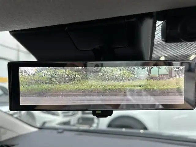 日産 オーラ G レザーエディション 神奈川県 2024(令6)年 0.5万km グレー NissanConnectナビ・フルセグ・USB・Bluetooth・AppleCarPlay/BOSEパーソナルプラスサウンドシステム/ビルトインETC2.0/USB電源ソケット（タイプC（フロント、リア）、タイプA（フロント））/ワイヤレス充電/プロパイロット（ナビリンク機能付）/プロパイロット緊急停止支援システム（SOSコール機能付）/インテリジェントエマージェンシーブレーキ/踏み間違い衝突防止アシスト/標識検知機能/前方衝突予測警報/車線逸脱警報/ふらつき警報/車線逸脱防止支援システム/フロント＆バックソナー/エマージェンシーストップシグナル/後側方衝突防止支援システム/後側方車両検知警報/後退時車両検知警報/車両接近追放装置/革巻きステアリング/ステアリングスイッチ/本革シート/運転席パワーシート/純正ドライブレコーダー/インテリジェントルームミラー/オートブレーキホールド/LEDヘッドライト/LEDフォグランプ/純正17インチアルミ/純正フロアマット/保証書/取扱説明書/インテリジェントキー×2