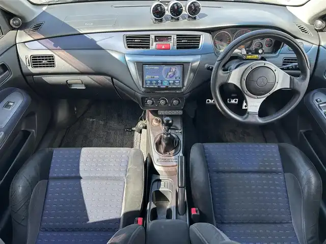 三菱 ランサー GSR エボリューションⅧ 岡山県 2004(平16)年 10.4万km クールシルバーメタリック 登録時走行距離103605km/社外ナビ/地デジ(AM/FM/CD/DVD/TV)/ETC/フロントエアロ/純正レカロシート/純正ブレンボキャリパー/純正MOMOステアリング/クスコ車高調/社外カーボンボンネット/トラストマフラー/３連Defiメーター/HKSブーストコントローラー/ALPINEツイーター/センターデフロック/18インチエボX純正AW