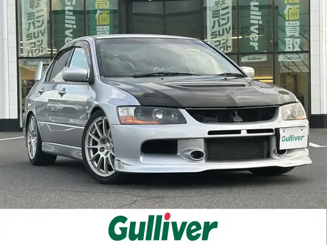 三菱 ランサー GSR エボリューションⅧ 岡山県 2004(平16)年 10.4万km クールシルバーメタリック 登録時走行距離103605km/社外ナビ/地デジ(AM/FM/CD/DVD/TV)/ETC/フロントエアロ/純正レカロシート/純正ブレンボキャリパー/純正MOMOステアリング/クスコ車高調/社外カーボンボンネット/トラストマフラー/３連Defiメーター/HKSブーストコントローラー/ALPINEツイーター/センターデフロック/18インチエボX純正AW