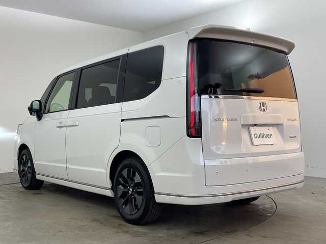 ホンダ ステップワゴン スパーダ eHEV 兵庫県 2025(令7)年 0.1千km プラチナホワイトパール ・登録済未使用車 距離5Km/・純正11.4インチナビ（LXM-247VFLi）/TV/Bluetooth/CD/DVD/USB/・純正15.6インチフリップダウンモニター（VM-231FE）/・バックカメラ/・Honda　SENSING/衝突軽減ブレーキ/先行車発進お知らせ機能/歩行者事故低減ステアリング/路外逸脱抑制機能/標識認識機能/アダプティブクルーズコントロール/車線維持支援システム/トラフィックジャムアシスト/ブラインドスポットインフォメーション/誤発進抑制機能/後方誤発進抑制機能/近距離衝突軽減ブレーキ/急アクセル抑制機能/パーキングセンサーシステム/オートハイビーム/・両側パワースライドドア/・パワーバックドア/・パドルシフト/・ハーフレザーシート/・全列USBチャージャー/・前席シートヒーター/・2列目オットマン/・LEDヘッドライト/・フォグランプ/・純正16インチアルミホイール/・スマートキー