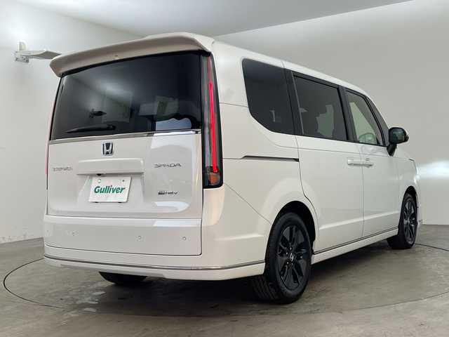 ホンダ ステップワゴン スパーダ eHEV 兵庫県 2025(令7)年 0.1千km プラチナホワイトパール ・登録済未使用車 距離5Km/・純正11.4インチナビ（LXM-247VFLi）/TV/Bluetooth/CD/DVD/USB/・純正15.6インチフリップダウンモニター（VM-231FE）/・バックカメラ/・Honda　SENSING/衝突軽減ブレーキ/先行車発進お知らせ機能/歩行者事故低減ステアリング/路外逸脱抑制機能/標識認識機能/アダプティブクルーズコントロール/車線維持支援システム/トラフィックジャムアシスト/ブラインドスポットインフォメーション/誤発進抑制機能/後方誤発進抑制機能/近距離衝突軽減ブレーキ/急アクセル抑制機能/パーキングセンサーシステム/オートハイビーム/・両側パワースライドドア/・パワーバックドア/・パドルシフト/・ハーフレザーシート/・全列USBチャージャー/・前席シートヒーター/・2列目オットマン/・LEDヘッドライト/・フォグランプ/・純正16インチアルミホイール/・スマートキー