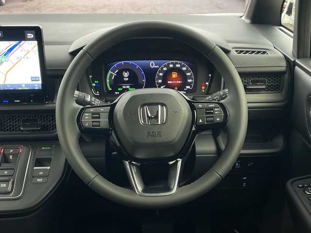 ホンダ ステップワゴン スパーダ eHEV 兵庫県 2025(令7)年 0.1千km プラチナホワイトパール ・登録済未使用車 距離5Km/・純正11.4インチナビ（LXM-247VFLi）/TV/Bluetooth/CD/DVD/USB/・純正15.6インチフリップダウンモニター（VM-231FE）/・バックカメラ/・Honda　SENSING/衝突軽減ブレーキ/先行車発進お知らせ機能/歩行者事故低減ステアリング/路外逸脱抑制機能/標識認識機能/アダプティブクルーズコントロール/車線維持支援システム/トラフィックジャムアシスト/ブラインドスポットインフォメーション/誤発進抑制機能/後方誤発進抑制機能/近距離衝突軽減ブレーキ/急アクセル抑制機能/パーキングセンサーシステム/オートハイビーム/・両側パワースライドドア/・パワーバックドア/・パドルシフト/・ハーフレザーシート/・全列USBチャージャー/・前席シートヒーター/・2列目オットマン/・LEDヘッドライト/・フォグランプ/・純正16インチアルミホイール/・スマートキー