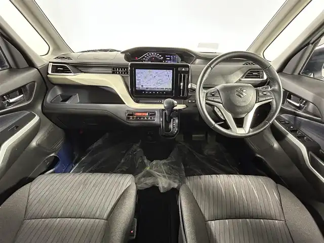 スズキ ソリオ HV MZ 佐賀県 2021(令3)年 5.5万km ピュアホワイトP 純正9インチナビ/AM/FM/CD/DVD/フルセグTV/Bluetooth/全方位カメラ/リアモニター/ワンオーナー/両側パワースライドドア/衝突被害軽減システム/クルーズコントロール(追従あり)/前後誤発進抑制機能/リアパーキングセンサー/LEDヘッドライト/LEDフォグ/オートライト/オートマチックハイビーム/革巻きステアリング/ステアリングスイッチ/前席シートヒーター/後席テーブル/レーンアシスト/サーキュレーター/純正フロアマット/純正１５インチアルミホイール/ドアバイザー/ISOFIX