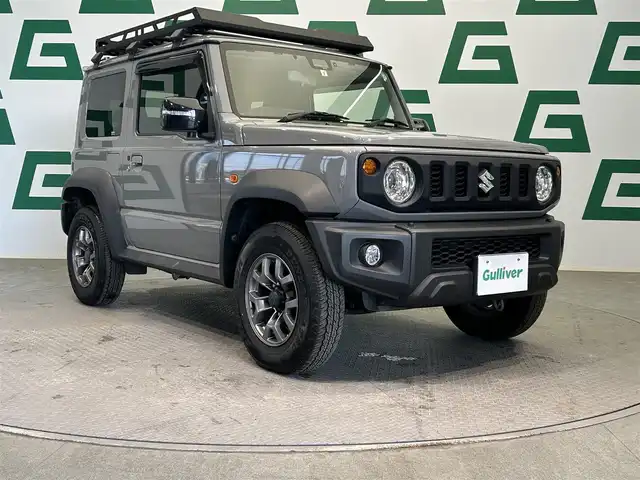 スズキ ジムニー シエラ JC 鹿児島県 2019(令1)年 3.9万km ミディアムグレー ７インチワイドＳＤナビ【AVN-D9W】　/スズキセーフティサポート/前席シートヒーター　/純正ＬＥＤヘッドライト　/フロントフォグライト　/ステアリングリモコン　/クルーズコントロール　/ヒーテッドドアミラー　/ルーフキャリア/ナビ連動型前方ドライブレコーダー