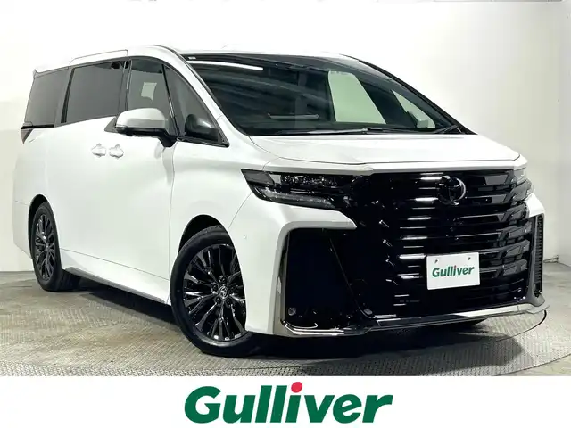 トヨタ ヴェルファイア ハイブリット Z プレミア 大阪府 2024(令6)年 0.8万km プラチナホワイトパールマイカ トヨタチームメイト　アドバンストパーク　左右独立ムーンルーフ　純正ナビＴＶ　３６０カメラ　デジタルインナーミラー　衝突軽減　レーダーＣ　ＢＳＭ　クリアランスソナー　ＨＵＤ　置くだけ充電　１００Ｖ電源