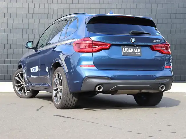 ＢＭＷ Ｘ３ xDrive20d Mスポーツ 宮城県 2018(平30)年 5万km 青 純正ナビ【ＢＴ／ＣＤ／ＤＶＤ／フルセグＴＶ／ＵＳＢ】/アダプティブクルーズコントロール　/インテリジェントセーフティ/ワイヤレス充電　/ヘッドアップディスプレイ/ハーフレザーシート　/前席パワーシート/D席メモリー付き/パドルシフト　/パノラマビューモニター/バックカメラ　/前席シートヒーター　/オートホールド/ルーフレール/パーキングアシスト/ドライビングモードスイッチ/パワーバックドア/純正20インチAW/ディスプレイキー/ダウンヒルアシストコントロール/ミラー一体型ETC/LEDヘッドライト/前後コーナーセンサー/禁煙車