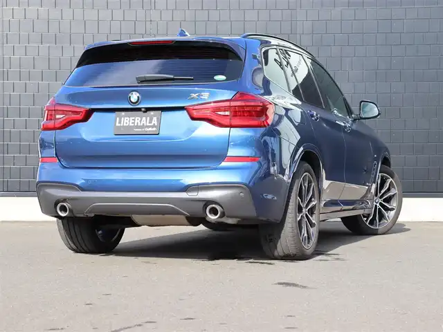 ＢＭＷ Ｘ３ xDrive20d Mスポーツ 宮城県 2018(平30)年 5万km 青 純正ナビ【ＢＴ／ＣＤ／ＤＶＤ／フルセグＴＶ／ＵＳＢ】/アダプティブクルーズコントロール　/インテリジェントセーフティ/ワイヤレス充電　/ヘッドアップディスプレイ/ハーフレザーシート　/前席パワーシート/D席メモリー付き/パドルシフト　/パノラマビューモニター/バックカメラ　/前席シートヒーター　/オートホールド/ルーフレール/パーキングアシスト/ドライビングモードスイッチ/パワーバックドア/純正20インチAW/ディスプレイキー/ダウンヒルアシストコントロール/ミラー一体型ETC/LEDヘッドライト/前後コーナーセンサー/禁煙車