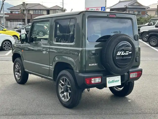 スズキ ジムニー XC 愛媛県 2023(令5)年 4.3万km ジャングルグリーン 社外ナビ(Bluetooth/フルセグTV)/クルーズコントロール/バックカメラ/前後ドライブレコーダー/背面タイヤ(BRIDGESTONE DUELER H/L)/純正16インチAW/オートLEDヘッドライト/フォグランプ/４WD切り替え/前席シートヒーター/ヒートミラー/ステアリングリモコン/横滑り防止装置/レーンキープアシスト/ダウンヒルアシストコントロール/ABS