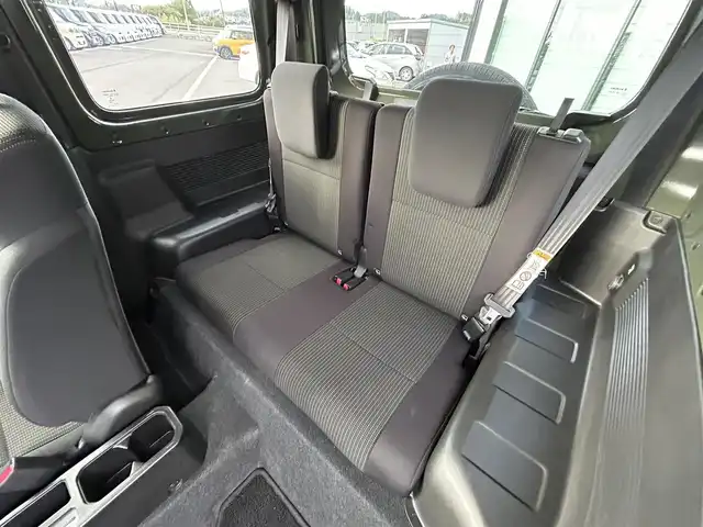 スズキ ジムニー XC 愛媛県 2023(令5)年 4.3万km ジャングルグリーン 社外ナビ(Bluetooth/フルセグTV)/クルーズコントロール/バックカメラ/前後ドライブレコーダー/背面タイヤ(BRIDGESTONE DUELER H/L)/純正16インチAW/オートLEDヘッドライト/フォグランプ/４WD切り替え/前席シートヒーター/ヒートミラー/ステアリングリモコン/横滑り防止装置/レーンキープアシスト/ダウンヒルアシストコントロール/ABS