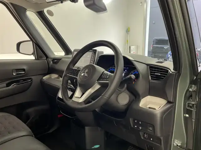 三菱 デリカミニ T プレミアム 滋賀県 2025(令7)年 0.1千km 緑Ⅱ 純正9インチディスプレイオーディオ/【Bluetooth/Apple CarPlay/Android Auto】/両側パワースライドドア/全方位カメラ/ハーフレザーシート/MI-PILOT/クリアランスソナー/LEDヘッドライト/オートマチックハイビーム/レーンキープアシスト/衝突軽減ブレーキ/ヒルディセントコントロール/D/Nシートヒーター/ステアリングヒーター/デジタルインナーミラー/ルーフレール/電動パーキングブレーキ/オートブレーキホールド/プッシュスタート/スマートキー/ステアリングリモコン