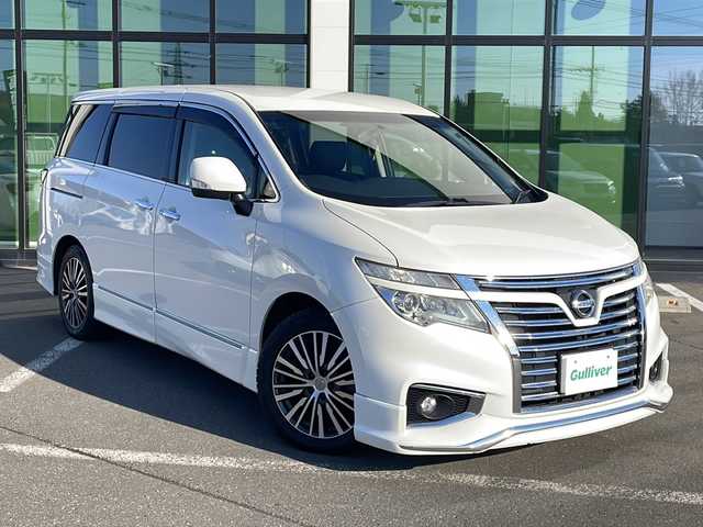 日産 エルグランド 350ハイウェイスター 道東・釧路十勝 2014(平26)年 11.3万km ブリリアントホワイトパール ・スマートキー/・純正エンジンスターター/・7インチ社外ナビ(AM/FM/CD/DVD/TV/BT)/・両側パワースライドドア/・４WD/・パワーバックドア/・電格ミラー/・ドアバイザー/・純正フロアマット/・純正エアロ(フロント/サイド/リア)/・クルーズコントロール/・イエローフォグランプ/・社外10インチフリップダウン/・ハーフレザーシート/・オットマン/・バックカメラ