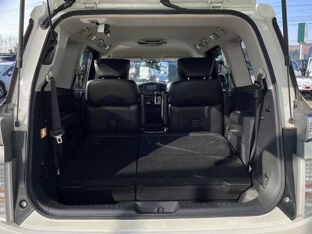 日産 エルグランド 350ハイウェイスター 道東・釧路十勝 2014(平26)年 11.3万km ブリリアントホワイトパール ・スマートキー/・純正エンジンスターター/・7インチ社外ナビ(AM/FM/CD/DVD/TV/BT)/・両側パワースライドドア/・４WD/・パワーバックドア/・電格ミラー/・ドアバイザー/・純正フロアマット/・純正エアロ(フロント/サイド/リア)/・クルーズコントロール/・イエローフォグランプ/・社外10インチフリップダウン/・ハーフレザーシート/・オットマン/・バックカメラ