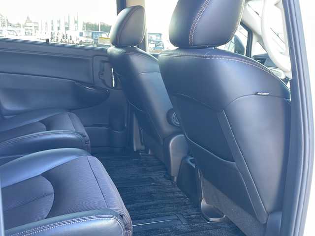 日産 エルグランド 350ハイウェイスター 道東・釧路十勝 2014(平26)年 11.3万km ブリリアントホワイトパール ・スマートキー/・純正エンジンスターター/・7インチ社外ナビ(AM/FM/CD/DVD/TV/BT)/・両側パワースライドドア/・４WD/・パワーバックドア/・電格ミラー/・ドアバイザー/・純正フロアマット/・純正エアロ(フロント/サイド/リア)/・クルーズコントロール/・イエローフォグランプ/・社外10インチフリップダウン/・ハーフレザーシート/・オットマン/・バックカメラ