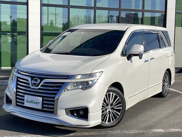 日産 エルグランド 350ハイウェイスター 道東・釧路十勝 2014(平26)年 11.3万km ブリリアントホワイトパール ・スマートキー/・純正エンジンスターター/・7インチ社外ナビ(AM/FM/CD/DVD/TV/BT)/・両側パワースライドドア/・４WD/・パワーバックドア/・電格ミラー/・ドアバイザー/・純正フロアマット/・純正エアロ(フロント/サイド/リア)/・クルーズコントロール/・イエローフォグランプ/・社外10インチフリップダウン/・ハーフレザーシート/・オットマン/・バックカメラ