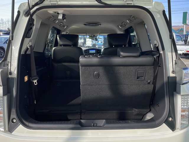 日産 エルグランド 350ハイウェイスター 道東・釧路十勝 2014(平26)年 11.3万km ブリリアントホワイトパール ・スマートキー/・純正エンジンスターター/・7インチ社外ナビ(AM/FM/CD/DVD/TV/BT)/・両側パワースライドドア/・４WD/・パワーバックドア/・電格ミラー/・ドアバイザー/・純正フロアマット/・純正エアロ(フロント/サイド/リア)/・クルーズコントロール/・イエローフォグランプ/・社外10インチフリップダウン/・ハーフレザーシート/・オットマン/・バックカメラ