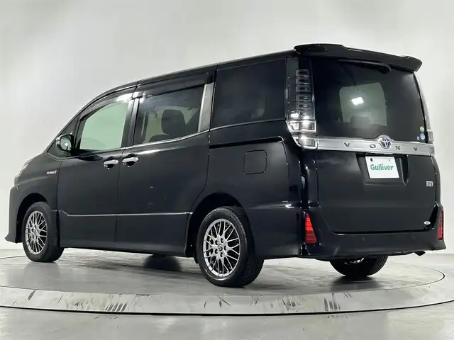トヨタ ヴォクシー ハイブリッド ZS 煌Ⅱ 佐賀県 2019(令1)年 4.5万km ブラック 純正ディーラーオプション9インチナビ/バックカメラ/フルセグテレビ　/CD/DVD/BT/SD/FM.AM/プリクラッシュセーフティ/レーンディパーチャーアラート/オートハイビーム/クルーズコントロール/シートヒーター/純正ドライブレコーダー/純正フロアマット/純正ドアバイザー/プッシュスタート
