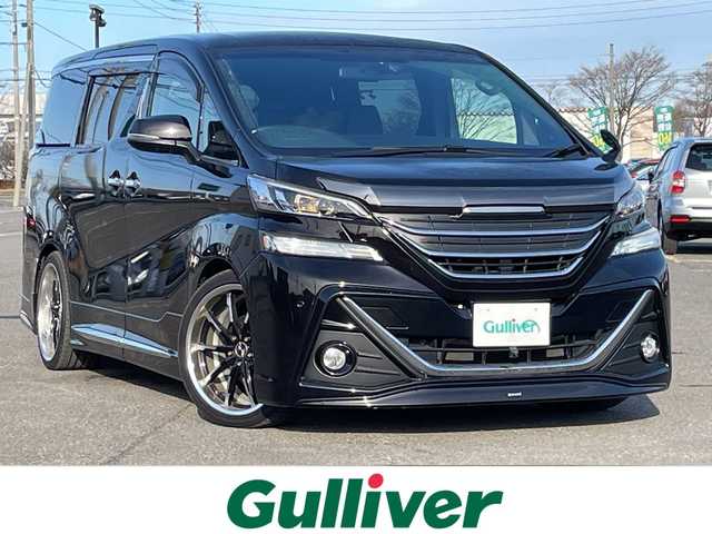 トヨタ ヴェルファイア 2.5Z Aエディデョン ゴールデンアイズ 道央・札幌 2017(平29)年 3万km バーニングブラッククリスタルシャインガラスフレーク ４WD/モデリスタエアロ/社外足廻り（ダウンサス）/純正ディーラーOPナビ/CD/DVD/BT/フルセグ/純正フリップダウンモニター/横滑り防止装置/クルーズコントロール/パーキングアシスト/クリアランスソナー/バック/フロントカメラ/ビルトインETC/ドライブレコーダー/アイドリングストップ/ECOMODE/nanoe/両側パワースライドドア/パワーバックドア/N席/２列目オットマン/ハーフレザーシート/革巻きウッドコンビステアリング/ステアリングリモコン/AC100V/電動パーキング/ブレーキホールド/MTモード付AT/プッシュスタート/スマートキー/LEDヘッドライト/オートライト/フォグランプ/電動格納ミラー/ウィンカーミラー/純正フロアマット/ドアバイザー/サスペンション/グリル積込
