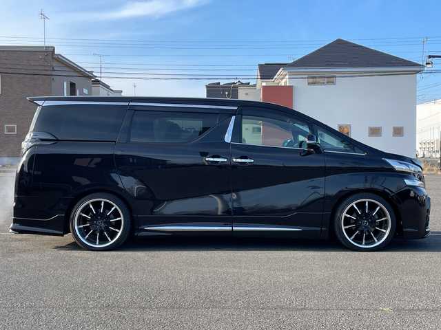 トヨタ ヴェルファイア 2.5Z Aエディデョン ゴールデンアイズ 道央・札幌 2017(平29)年 3万km バーニングブラッククリスタルシャインガラスフレーク ４WD/モデリスタエアロ/社外足廻り（ダウンサス）/純正ディーラーOPナビ/CD/DVD/BT/フルセグ/純正フリップダウンモニター/横滑り防止装置/クルーズコントロール/パーキングアシスト/クリアランスソナー/バック/フロントカメラ/ビルトインETC/ドライブレコーダー/アイドリングストップ/ECOMODE/nanoe/両側パワースライドドア/パワーバックドア/N席/２列目オットマン/ハーフレザーシート/革巻きウッドコンビステアリング/ステアリングリモコン/AC100V/電動パーキング/ブレーキホールド/MTモード付AT/プッシュスタート/スマートキー/LEDヘッドライト/オートライト/フォグランプ/電動格納ミラー/ウィンカーミラー/純正フロアマット/ドアバイザー/サスペンション/グリル積込