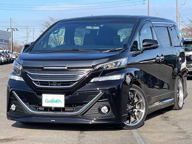 トヨタ ヴェルファイア 2.5Z Aエディデョン ゴールデンアイズ 道央・札幌 2017(平29)年 3万km バーニングブラッククリスタルシャインガラスフレーク ４WD/モデリスタエアロ/社外足廻り（ダウンサス）/純正ディーラーOPナビ/CD/DVD/BT/フルセグ/純正フリップダウンモニター/横滑り防止装置/クルーズコントロール/パーキングアシスト/クリアランスソナー/バック/フロントカメラ/ビルトインETC/ドライブレコーダー/アイドリングストップ/ECOMODE/nanoe/両側パワースライドドア/パワーバックドア/N席/２列目オットマン/ハーフレザーシート/革巻きウッドコンビステアリング/ステアリングリモコン/AC100V/電動パーキング/ブレーキホールド/MTモード付AT/プッシュスタート/スマートキー/LEDヘッドライト/オートライト/フォグランプ/電動格納ミラー/ウィンカーミラー/純正フロアマット/ドアバイザー/サスペンション/グリル積込